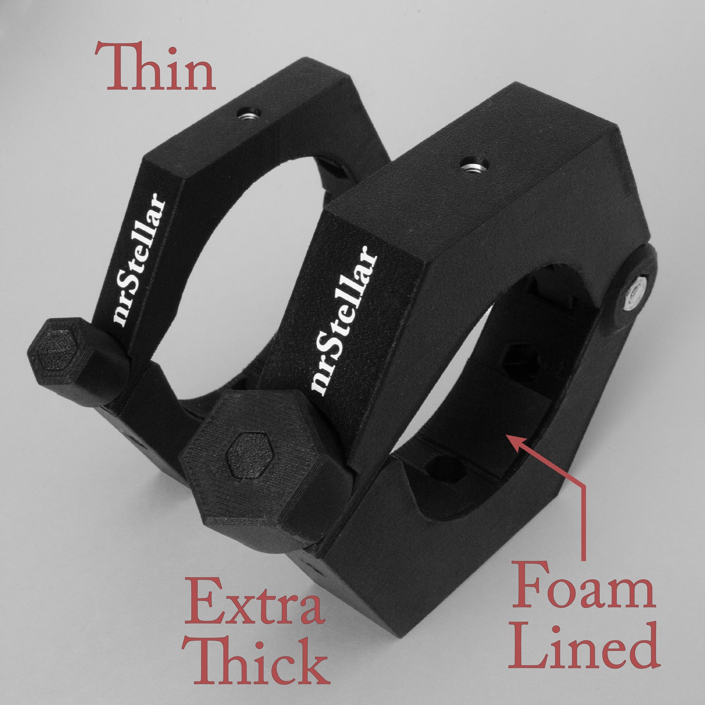Two hexagonal nrStellar lens rings side-by-side. The left one is skinnier than the right one. The left one is labeled "Thin" and the right one is labeled "Extra Thick". The rings are black with white text that reads "nrStellar". An arrow and text that reads "Foam Lined" points at the foam lining on the inside of the rings.