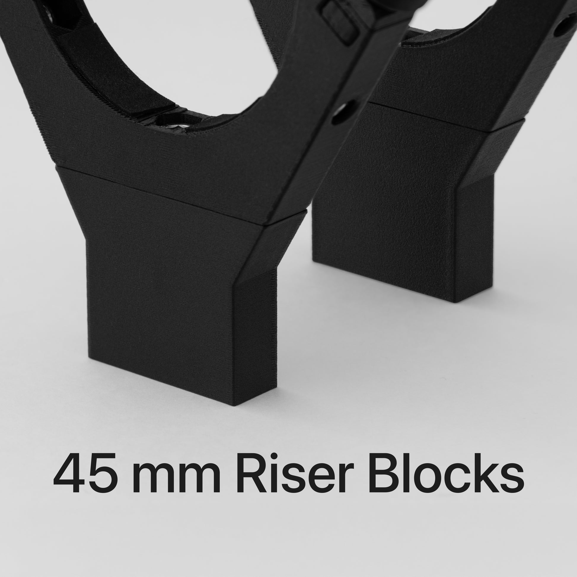 Black 45 mm riser blocks installed on a nrStellar ring kit