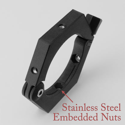 an nrStellar Camera Ring standing up against a white background. It is black. Text reads "Stainless Steel Embedded Nuts", with an arrow pointing to a nut embedded in the 3D printed ring. 