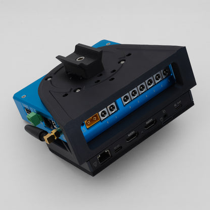 Pegasus Powerbox Ultimate attached to a MeLE mini PC on a telescope dovetail mount. The assembly is tilted to demonstrate that the ports are not obstructed. 