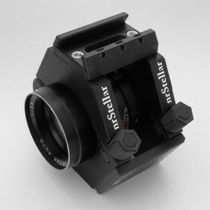 A nrStellar customized ring kit holding a small lens. There is a finderscope shoe attachment.