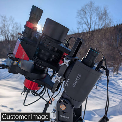 A Rokinon 135mm f2 Cinema Lens mounted in the nrStellar Rokinon/Samyang 135 Ring System. An autofocuser, guidescope, filterwheel, power box, and astronomy camera are also installed. Text reads "Customer Image'